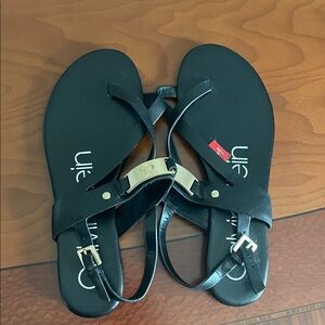 Calvin Klein Black Sandals with Gold Accents